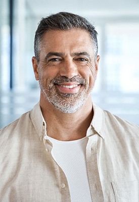 Closeup of man smiling in office
